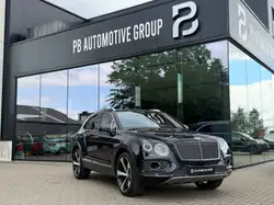 Bentley Bentayga CENTENARY EDITION-Massage-Pano-NAIM Soundsystem-Soft close-360°Cam-Elekrtische zetels-Verwarmde zetels achteraan
